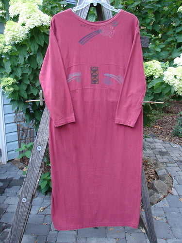 1995 Empire Dress Abstract Continuum Hollyberry Altered Size 1 displayed on a wooden rack, showcasing its unique eco-cotton material and specialized design features, emphasizing its vintage and elegant appeal.