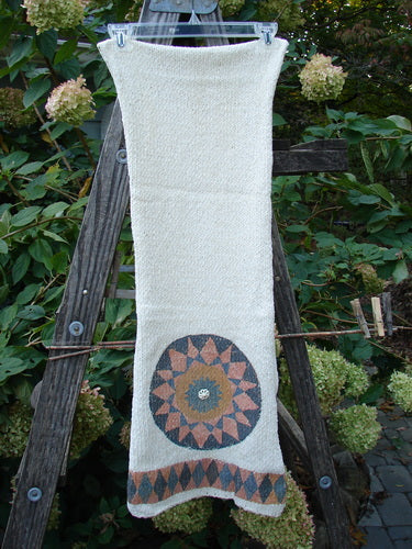 1991 Limited Edition Chenille Knit Scarf Medallion Natural OSFA displayed draped over a wooden ladder, showcasing its unique drape, rolled edges, and dual medallion accents with button centers.