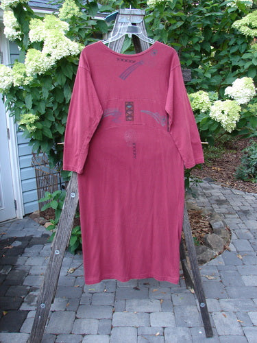 1995 Empire Dress Abstract Continuum Hollyberry Altered Size 1 displayed on a wooden rack, showcasing a specialized neckline, elongating shape, and tighter sleeves, representing Bluefishfinder.com's unique vintage collection.