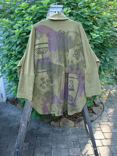 Barclay Reprocessed Golden Hour Deco Jacket Rear Folly Peapod OSFA featuring a unique design and oversized pockets, crafted from heavy-weight organic cotton, showcasing intricate detailing from Bluefishfinder.com's vintage-inspired collection.