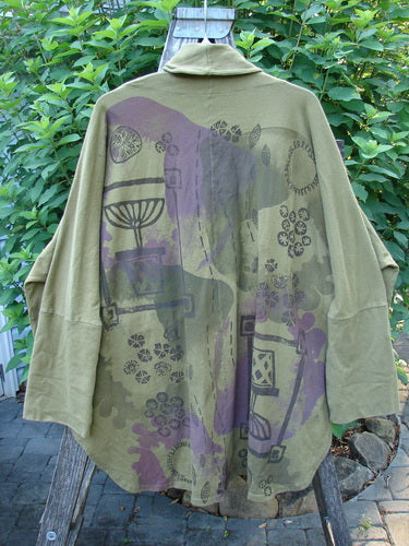 Barclay Reprocessed Golden Hour Deco Jacket Rear Folly Peapod OSFA, featuring a deep V-neck with stand-up collar, long dolman sleeves, diagonal oversized pockets, and unique rear paint design in heavy-weight cotton.