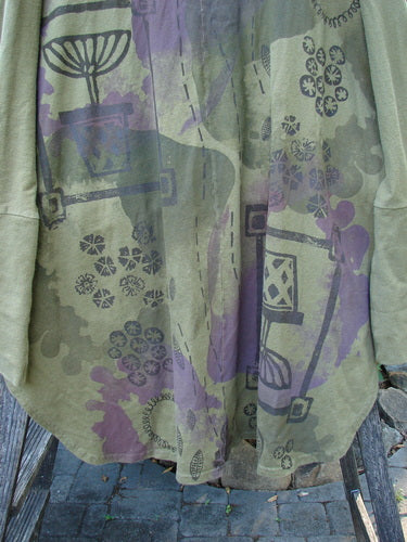Barclay Reprocessed Golden Hour Deco Jacket Rear Folly Peapod OSFA features a textured organic cotton design with drop dolman shoulders, ribbed sleeves, and oversized pockets, embodying BlueFishFinder's vintage charm and creative expression.