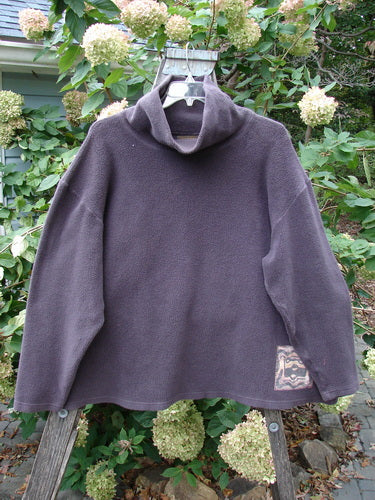 Barclay Patched Celtic Moss Big Collar Top Silly Pup Aubergine Size 1 displayed on a mannequin, showcasing its oversized A-line shape, vented sides, and unique plush fabric texture.