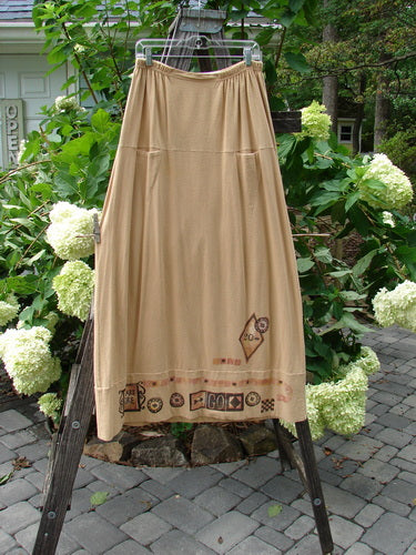 1998 Scrabble Skirt Games Bamboo Size 2, displayed on a rack, featuring a waistline with flat folded front, rear elastic, and two upper finger pockets.