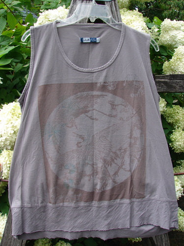 Barclay Flutter Bottom Tank Top Moon Bird in stone plum, size 2, with a sleeveless scoop neck and raw flutter hem. The soft, faded knit shows a muted moon bird graphic in a layered taupe and plum palette.