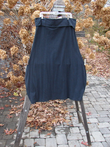 Barclay NWT Cotton Lycra Fold Over Bottom Bell Skirt Size 2 on clothes rack with black dress, close-ups of train track, wooden post, and metal object.