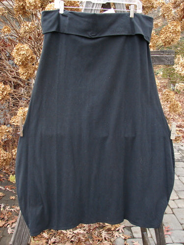 Barclay NWT Cotton Lycra Fold Over Bottom Bell Skirt on clothes rack, showcasing elegant design details.