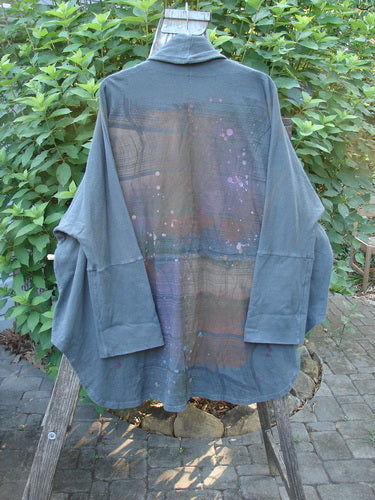 Barclay Reprocessed Golden Hour Deco Jacket in Black Olive, showcasing unique paint detailing in a rear rain and grid theme, thick cotton fabric, and oversized raw-edged pockets, exemplifying BlueFishFinder's vintage style.