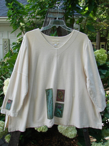 2000 Patched Resort Sweatshirt Nature Dove Size 2 featuring painted nature-themed patches, vented sides, drop shoulders, and a double-paneled V-shaped neckline.