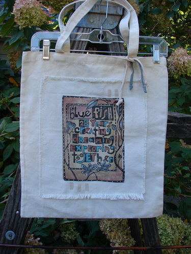 2000 PMU Patched Cotton Canvas Pocket Tote Promo Natural One Size, featuring blue and pink design, tightly woven straps, and colorful rippie accents, embodying sustainable vintage style from Bluefishfinder.com.