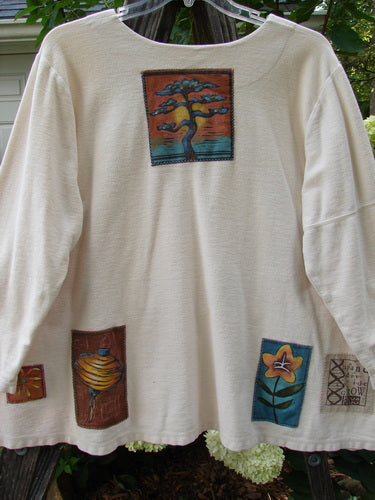 2000 Patched Resort Sweatshirt Nature Dove Size 2 featuring a white shirt with patchwork design, billowy full swing, painted nature-themed patches, double-paneled V-shaped neckline, and vented sides.