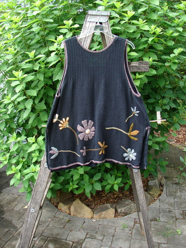 1998 Limited Edition Peruvian Embroidered Sweater Vent Tunic Floral Vine Black OSFA featuring intricate floral vine embroidery on soft cotton knit, wide line shape, varying hemline, and yarn-covered buttons.