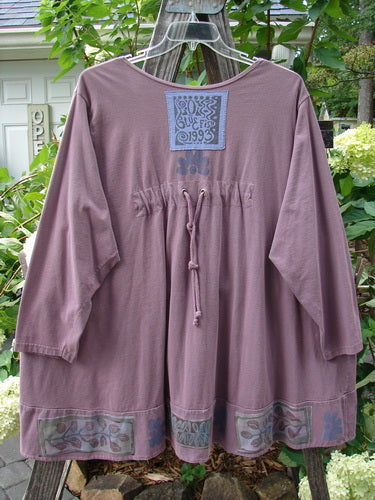 1993 Modernismo Cardigan Nature Plum Wine Size 2, featuring a generous nature-themed paint, old-timey buttons, two kangaroo pockets, A-line swing, handy drawcord back, oversized patch, and banded hemline.