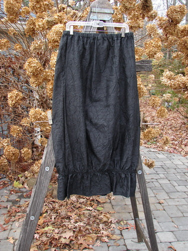 2000 Shaunting Crushed Silk Skirt, black, size 2, on clothes rack.