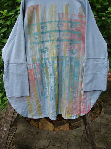 Barclay NWT Reprocessed One Button Golden Hour Jacket features a heavy cotton texture, distinctive single button closure, drop dolman shoulders, ribbed sleeves, and oversized pockets with a floral rear design.