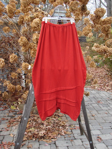 2000 Thermal Awen Skirt, Bittersweet, size 2, with full elastic waistband, generous bell shape, and textured diagonal hemline.