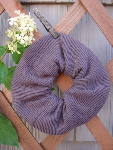 2000 PMU Thermal Hair Scrunchie Unpainted Brum One Size on a wooden fence, showcasing its ruffled fabric and soft texture, highlighting Bluefishfinder.com's dedication to sustainable, vintage-inspired accessories.