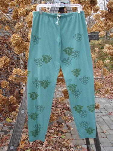 Barclay Cotton Lycra Relaxed Legging with Orchid Theme Paint, Size 2 AI. A pair of pants featuring a grape design.