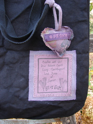 1994 PMU Patched Tote Bag Forest Walk Black One Size featuring a purple heart-shaped patch on a black canvas, highlighting long shoulder straps and a gusset bottom, showcasing sustainable vintage design.