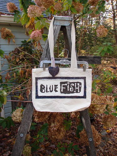 1995 PMU Patched Tote Bag Sling featuring frayed vintage logo on a wooden ladder, crafted from heavyweight washed natural canvas with extra-long straps and a colorful puffy heart accent.