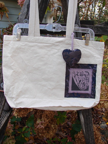 1995 PMU Patched Tote Bag Sling Vintage Logo Frayed Natural Lilac One Size, featuring a colorful puffy heart accent and frayed patch, crafted from heavyweight washed canvas with long shoulder straps.