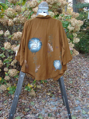 A Barclay Viscose Lilac Scallop Jacket in Copper with a fallen leaf theme paint design, featuring tiny abalone diamond shape buttons and a distinctive scallop hemline. Size 0.