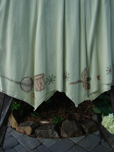 1994 Leaf Top Music Garden Aloe Size 2 featuring a dragonfly design on white fabric, unique painted hemline, and tailored swing drape, part of Blue Fish’s vintage summer collection.