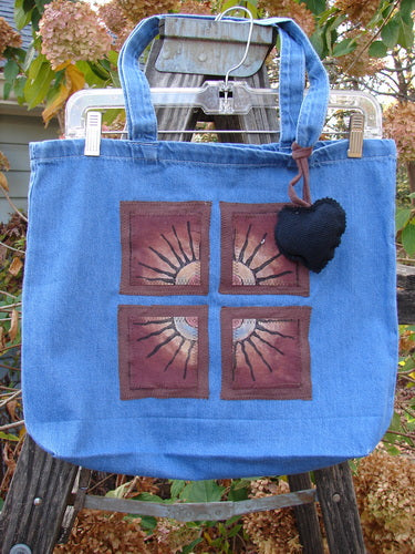 1998 PMU Patched Tote Bag Fall Quad Washed Denim One Size featuring a colorful puffy heart accent, tote-length shoulder straps, and a gusset bottom, embodying sustainable vintage design by Jennifer Barclay.