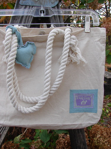 Barclay PMU Patched Canvas Rope Pocket Tote Bag Butterfly Natural One Size features a cotton rope handle, blue heart and butterfly patches, and a gusset bottom, highlighting Bluefishfinder.com's commitment to vintage creativity.