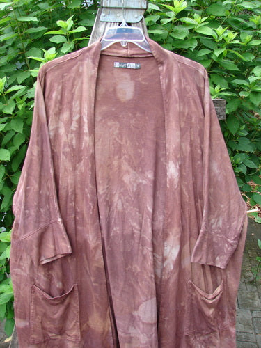 Barclay Bamboo Dolman Day Jacket in Mottled Autumn Copper, featuring an open front, dolman sleeves, exterior pockets, and a unique hemline. Ideal for expressing individuality, available from Bluefishfinder.com.