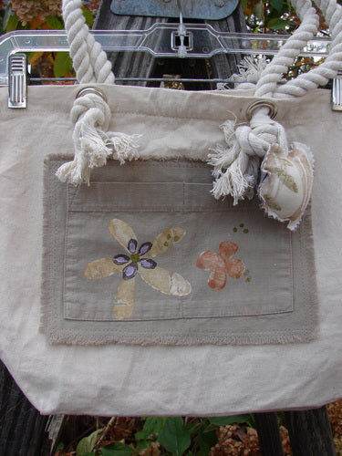 2000 PMU Patched Canvas Rope Pocket Tote Bag Daisy Natural One Size featuring a floral design, cotton rope shoulder straps, and front pocket patch, highlighting vintage creativity from Bluefishfinder.com.