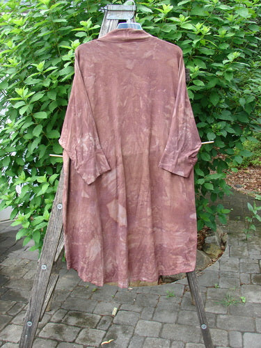 Barclay Bamboo Dolman Day Jacket Unpainted Mottled Autumn Copper OSFA on a rack, showcasing its dolman long sleeves, open front, and unique hemline, reflecting BlueFishFinder's vintage, expressive style.