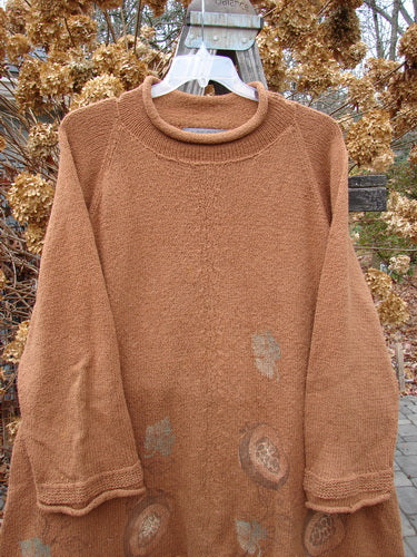 1998 Rocky Mountain Raglan Sweater with a loose mock turtleneck, diagonal shoulder seams, and contrasting knit accents.
