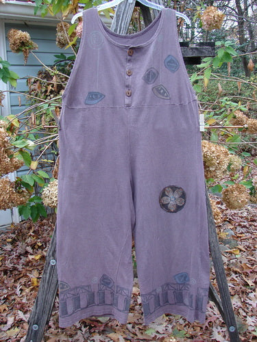 1993 PMU Patched Wide Pant Overall Jumper Travel Dusty Plum Size 1 features super wide belled legs, flower patches, and vintage travel-themed designs, encapsulating Bluefishfinder.com's unique vintage collectible style.