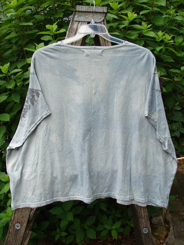 Barclay Cricket Cap Sleeve Tee Pine Forest Blue Dawn OSFA displayed on a swinger, showcasing its cool cap sleeves, slight hip flare, seamless shoulder, and rounded hemline, reflecting Bluefishfinder.com's vintage style.