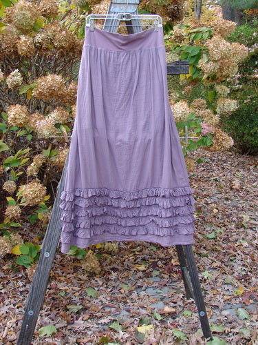 Barclay NWT Voile Fold Over Five Ruffle Skirt, Dusty Lavender, Size 2. A skirt with a full cotton fold over waist panel and a beautiful ruffled five-row paneled hemline.