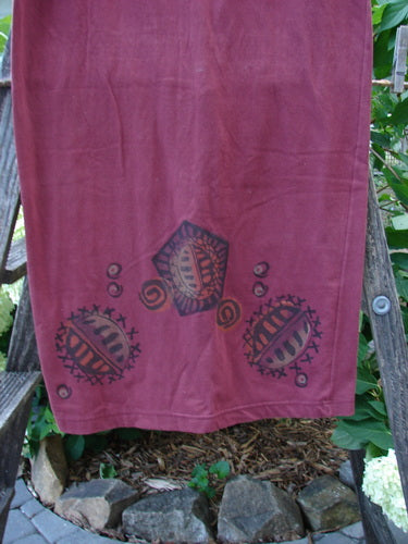 1996 Cotton Lycra Column Skirt River Rock Cayenne Size 1 displayed on a ladder with intricate designs, highlighting its full flattened elastic waistline and slimming pegged hemline.