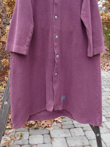 2000 Celtic Moss Hobo Coat Unpainted Murple Size 1: A long coat with bell sleeves, metal buttons, and a deep V neckline, made from soft and heavy Celtic Moss fabric.
