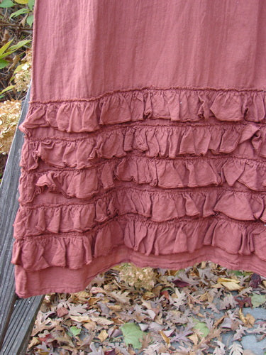 Barclay NWT Voile Foldover Five Ruffle Skirt, a close-up of a skirt with a ruffled five-row paneled hemline, made from light organic voile batiste.