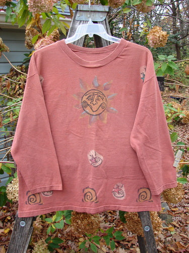 1991 Long Sleeved Tee Sun Guy Brick OSFA features a whimsical sun drawing on the front. This vintage-inspired piece embodies Bluefishfinder's unique, expressive style, perfect for showcasing individuality.