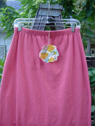 1996 NWT Cotton Lycra Column Skirt Unpainted Oriole Size 2 features a flower tag, full elastic waistline, tapering shape, pegged hemline, and back kick vent.