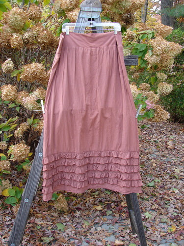 Barclay NWT Voile Foldover Five Ruffle Skirt on a clothes line, showcasing its lovely organic texture and billowy flare.