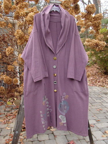 1994 Carriage Coat in Fugi Purple, OSFA: A billowy collar can be worn as a scarf or shawl. Oversized vintage buttons, deep side pockets, and an Asian fan theme add to the statement-making design.