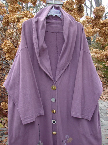 1994 Carriage Coat Asian Fan Fugi Purple OSFA: A billowy purple coat with an Asian fan design. Wide collar, oversized buttons, and deep side pockets.