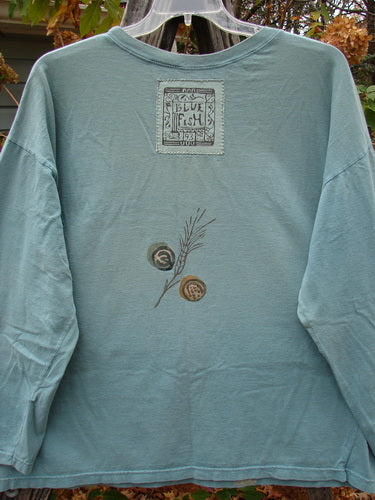 1993 Long Sleeved Tee Medallian Field Ocean OSFA featuring intricate patch designs and unique textures, capturing the vintage essence of Blue Fish Clothing's creative and individualistic style.