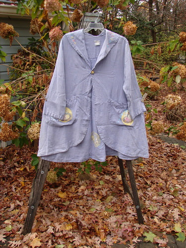 1999 Breeze Jacket Flower Heart Iris OSFA displayed on a swinger, showcasing its sailor collar, oversized pockets, and unique painted design, embodying BlueFishFinder's vintage, creative style.