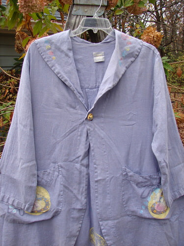 1999 Breeze Jacket Flower Heart Iris OSFA: A blue jacket adorned with floral and heart designs, featuring a sailor collar, oversized pockets, and a unique hemline, embodying vintage Blue Fish Clothing's creative style.