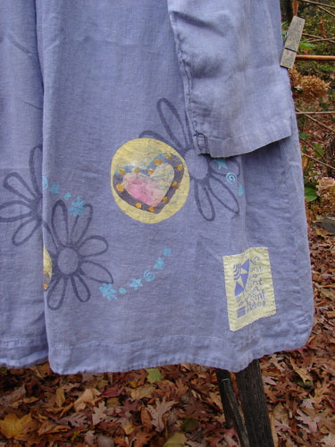 1999 Breeze Jacket Flower Heart Iris OSFA features a heart and flower design on a lightweight linen fabric, showcasing painted collar and oversized pockets, embodying Blue Fish Clothing's vintage flair.