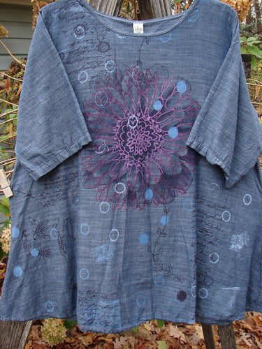 Barclay Woven Short Sleeved Pullover Tunic Mum Cross Dye Navy Size 1 features a blue fabric with a delicate purple floral pattern, showcasing vintage-inspired elegance and individual expression from Bluefishfinder.com.