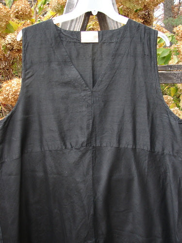 2000 Shaunting Silk Layering Jumper on clothes line, black dress, A-lined shape, deep V neckline, drop rear waistline, size 2 AI